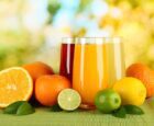 glasses of fruit juice and fruit
