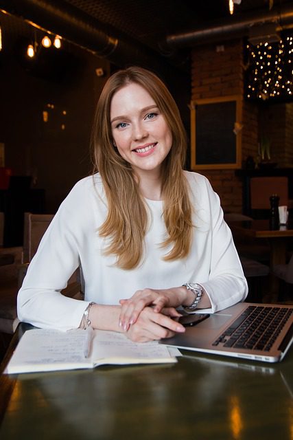 woman at desk with laptop