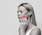woman with tooth pain